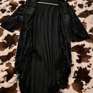 A nice cardigan sweater nice for a night out never worn it